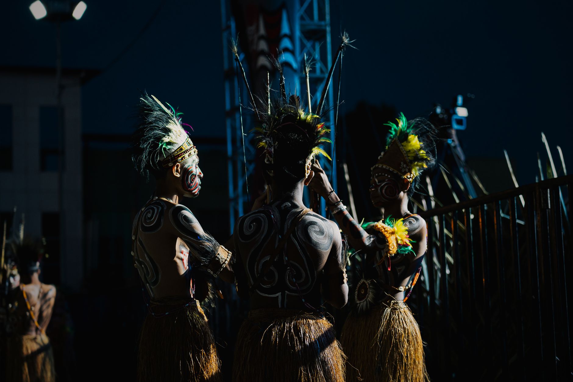 traditional papuan dance performance at night